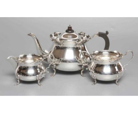 A SILVER THREE PIECE TEA SERVICE, maker's mark WA, Birmingham 1930 &amp; 1931 (teapot), of baluster form with everted strapwo