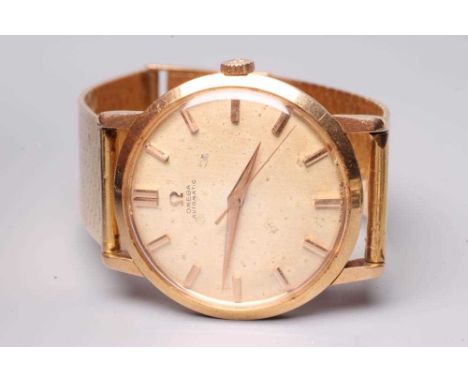 A GENTLEMAN'S 18CT GOLD OMEGA AUTOMATIC WRISTWATCH, the champagne dial with metal batons and central seconds hand, the twenty