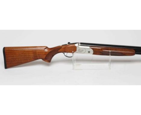 A YILDIZ 20 BORE OVER &amp; UNDER SHOTGUN, with 28" barrels, vented top and mid rib, fibre optic sight, manual safety, multi 