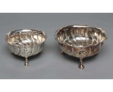 A LATE VICTORIAN SILVER BOWL, maker R &amp; S Garrard &amp; Co., London 1889, of wrythen fluted circular form with everted ri
