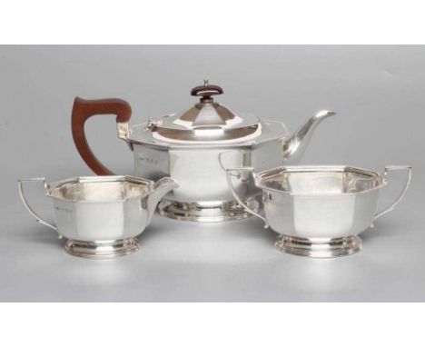 A SILVER THREE PIECE TEA SERVICE, maker's mark C&amp;S Ltd., Birmingham 1936, of flared hexagonal form with everted gadrooned