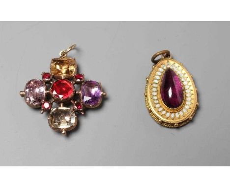 A MOURNING PENDANT, the central cabochon polished tear shaped amethyst (?) in rub-over setting within a border of white ename