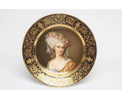 AN HOHENBERG (HUTSCHENREUTHER, BAVARIA) VIENNA STYLE PORCELAIN CABINET PLATE centrally painted in polychrome enamels by Wagne