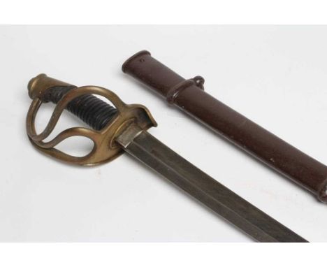 A FRENCH CAVALRY SABRE, possible US civil war import, with 35 1/2" curved and fullered blade, brass hilt, ribbed grip and ste