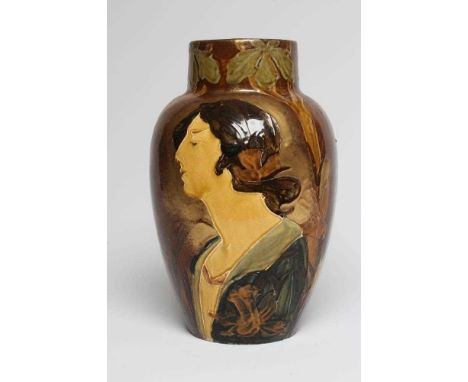 A SECESSIONIST EARTHENWARE VASE, early 20th century, of flared rounded cylindrical form, tubelined and painted in sombre colo