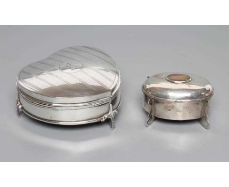 A SILVER HEART SHAPED DRESSING TABLE BOX, makers Saunders and Shepherd, Birmingham 1917, the engine turned striped cover cent