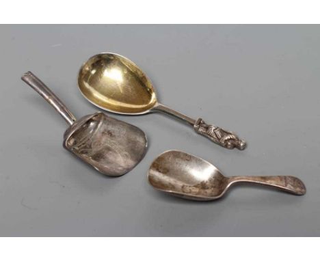 A LATE GEORGE III SILVER CADDY SPOON, maker's mark IT, Birmingham 1802, the shovel bowl engraved with a shield, together with