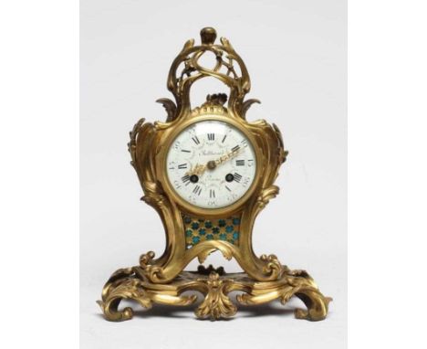 A FRENCH GILT CASED MANTEL CLOCK, 19th century, the eight day two train movement striking the hour and half hour on a gong, t