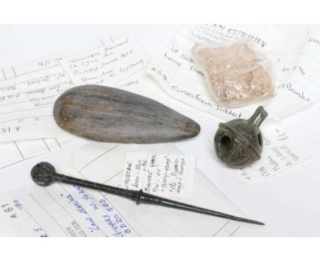 A COLLECTION OF ANTIQUITIES comprising of a cuneiform tablet, a Luristan bronze pin, a Neolithic Britain polished stone axe h