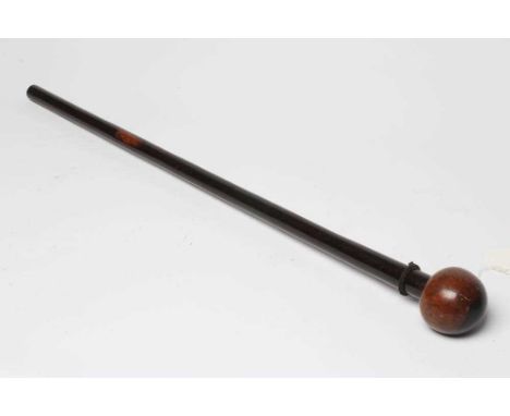 A ZULU KNOBKERRIE, late 19th century, with 28" shaft tapering to the grip and bi-colour head, 30 1/4" long (Est. plus 24% pre