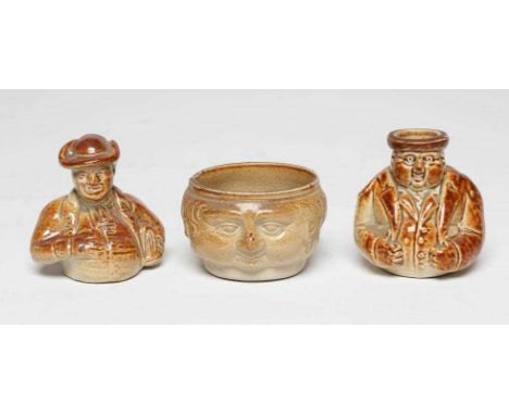 A VICTORIAN STONEWARE NOVELTY INKWELL modelled as Mr Pickwick with a quill hole to each shoulder, the reverse impressed D. La