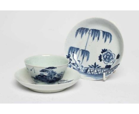 A CHAFFERS PORCELAIN TEA BOWL AND SAUCER, 1760-65, painted in underglaze blue with the Long Bridge pattern, together with a s