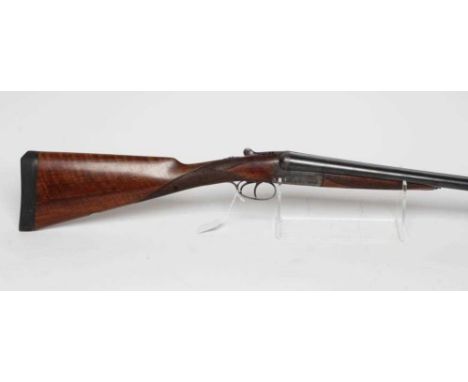 A WEBLEY &amp; SCOTT 12 BORE SIDE BY SIDE SHOTGUN, with 28" barrels, scroll engraved boxlock action, selective ejectors, auto
