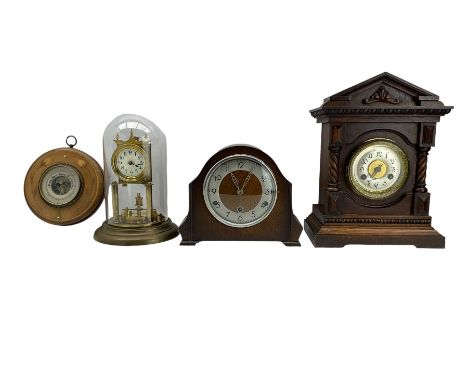 Two oak cased mantle clocks, aneroid barometer and torsion clock with a glass dome.