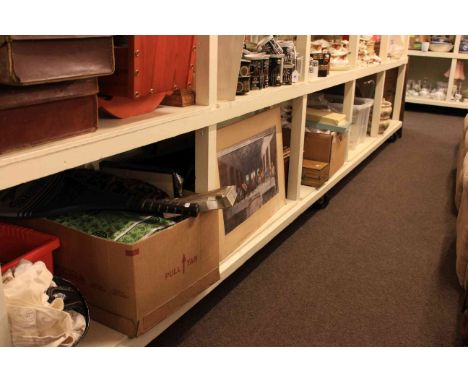 Full shelf of glass, china, linen, bowler hat, fur muff, instuments, books, storage jars, pictures, mirrors, projector screen