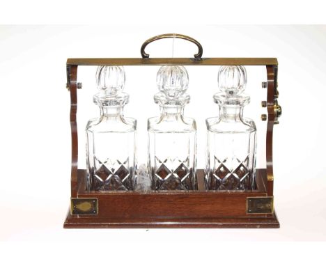 Three crystal decanter tantalus