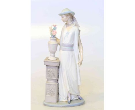 Lladro figure of lady with urn of flowers