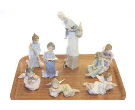 Lladro figure of nun and six Lladro angel figures