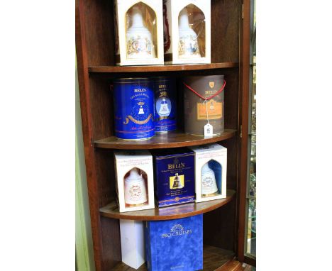 Seven Bells whisky Royal commemorative decanters, one 12 year old Bells decanter and one P & O cruises cognac (9)