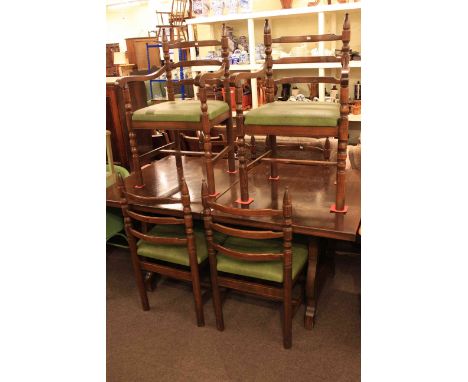 Rectangular oak extending dining table and six ladder back chairs