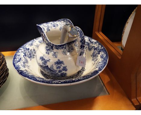 A large blue and white Minton's wash bowl and jug having pictorial pattern together with a blue and white ladle