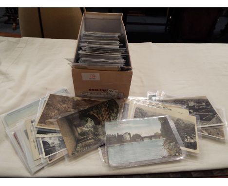 A quantity of early postcards of mainly landscape and architectural scenes, in protective sleeves