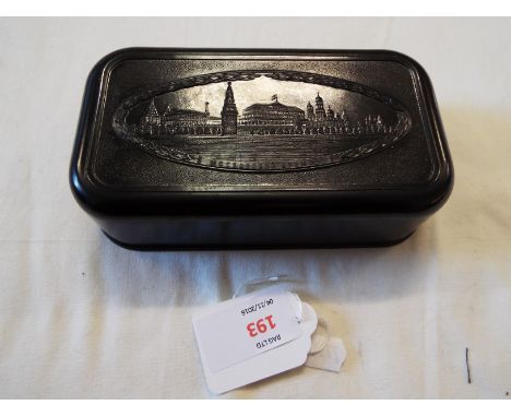 A Russian Bakelite box with moulded architectural design to lid