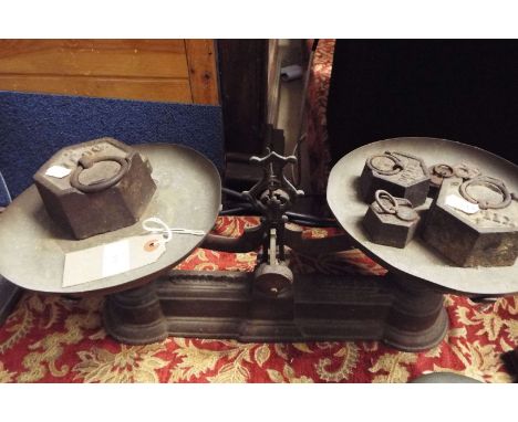 A set of weighing scales and weights