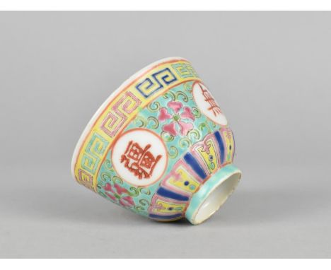 A Small Chinese Porcelain Tea Bowl Decorated in the Famille Rose Palette on Teal Ground, Circular Character Cartouches and Gr