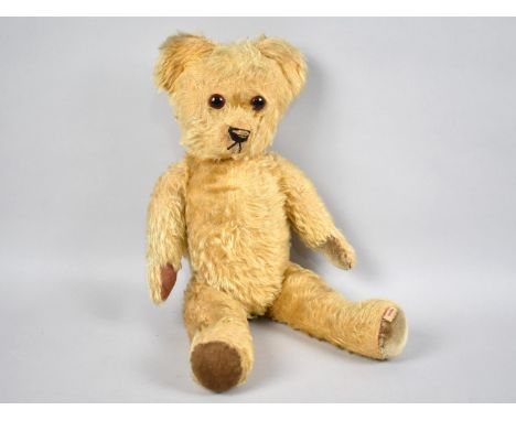 A Vintage Plush Irish Teddy Bear with Label to Foot 'Made in Eire' 