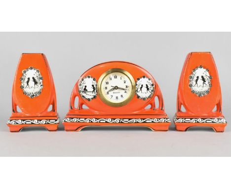 A German Clock Garniture by Mercedes decorated with Scenes of Silhouetted Children Playing, Battery Movement 