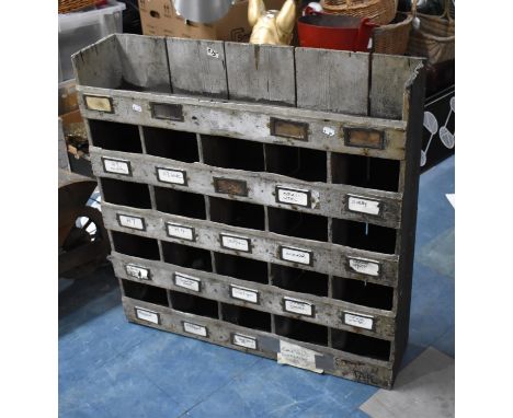 A Vintage Wooden 20 Section Wall Mounting Parts Unit, 80cms Wide and 81cms High 