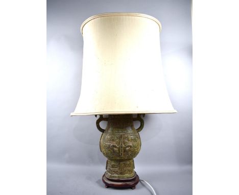 A Large Oriental Style Ceramic Table Lamp in the Form of an Archaic Two Handled Vase, Complete with Shade, 75cms High 