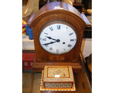 An oak cased eight day mantel clock, together with decorative inlaid musical cigarette box  