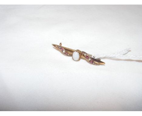 A 9ct brooch set with opal, seed pearl and ruby