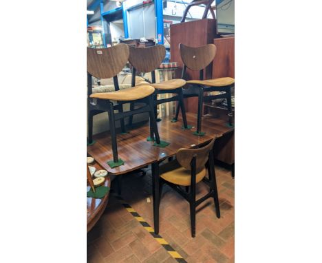 A mid century G Plan E Gomme stamped 1950's Librenza Tola drop leaf dining table and four 'butterfly' dining chairs  CONDITIO