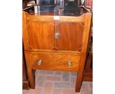 A Georgian mahogany commode 