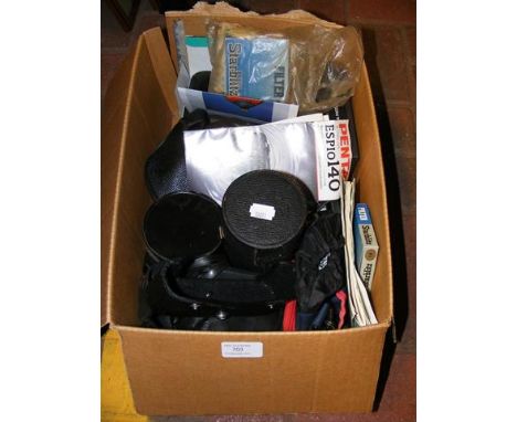 A box of vintage photographic equipment, including cameras, lenses and projector 