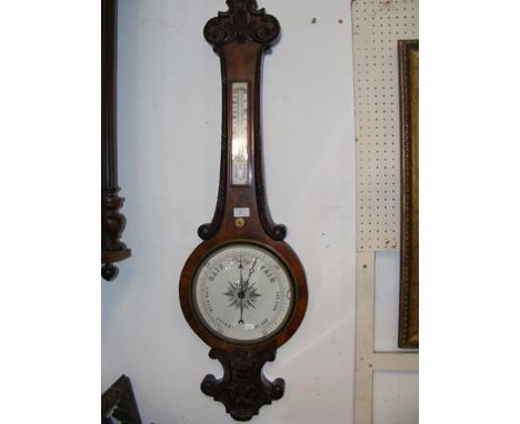 A Victorian walnut barometer/thermometer - 110cm 