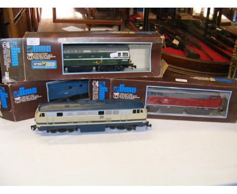 A boxed Lima electric 0 gauge locomotive, together with two others and one loose