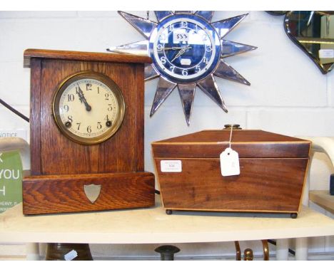 A tea caddy and oak cased eight day American mantel clock 