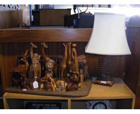 A quantity of treen and carved figures, together with abacus lamp  