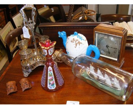 Various collectables, including Art Deco mantel clock, silver plated egg cruet, etc. 