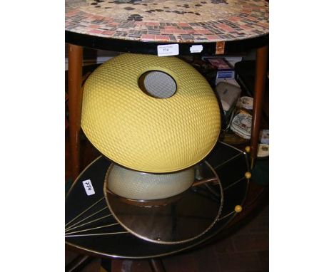 A mid century circular coffee table with tiled top, together with Atomic Sputnik eye mirror and ceiling light shade 