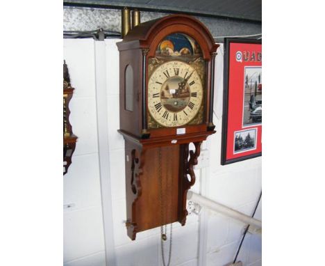 A reproduction wall clock with painted face 
