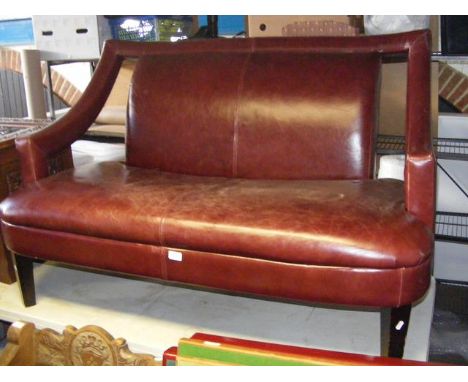 A leather style two seater sofa - approx. 140cm 