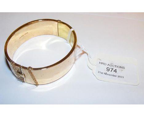 A 9ct bangle CONDITION REPORT We have attached a number of additional images to showcase the lot in further detail.Note the d