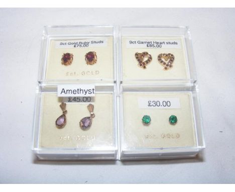 Four pairs of new 9ct gold stud earrings including ruby and other