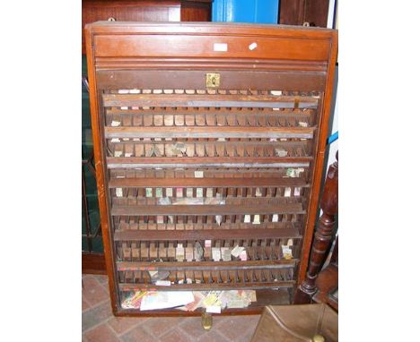 An old tambour fronter railway ticket cabinet, containing a large collection of tickets - 110cm x 75cm