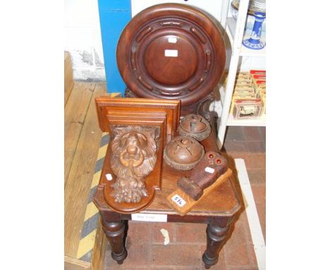 A hall chair, pair of Brazil nut ornaments, carved lion wall bracket and an 'owl' door knocker  